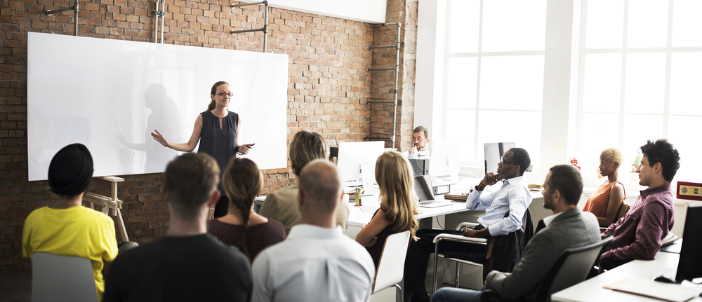 Empowered Employee Talking In Meeting